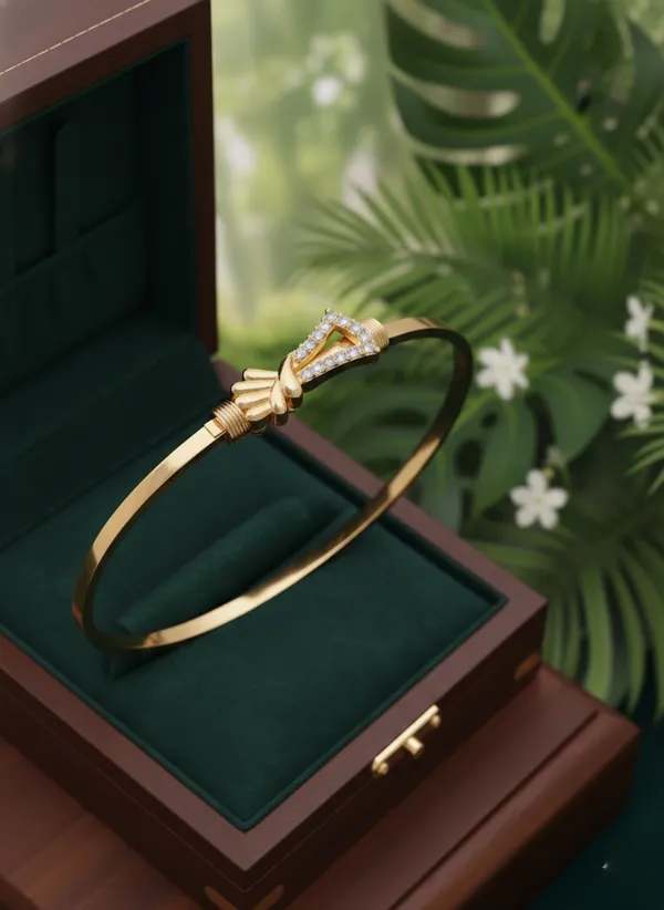 Delicate_Gold_Finish_Bangle_Bracelet_featuring_Pavé_Crystal_Knot_Motif