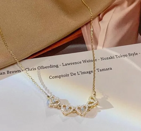 Four_Leaf_Clover_to_Four_Hearts_Convertible_Pendant