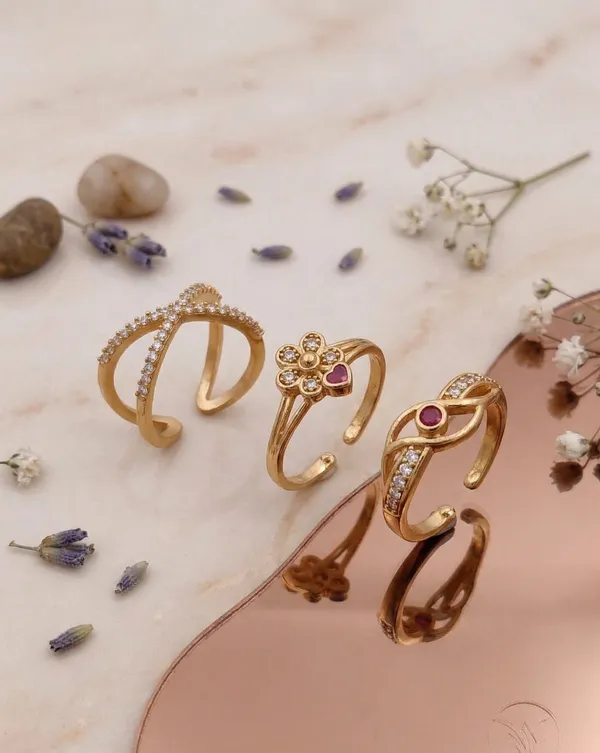 Gold-Plated_Adjustable_Ring_Set_of_3_–_Ethnic_Floral_&_Infinity_Designs_with_Ruby_and_Zircon_Accents