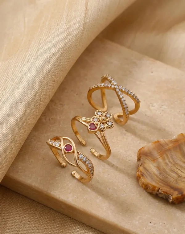 Gold-Plated_Adjustable_Ring_Set_of_3_–_Ethnic_Floral_&_Infinity_Designs_with_Ruby_and_Zircon_Accents