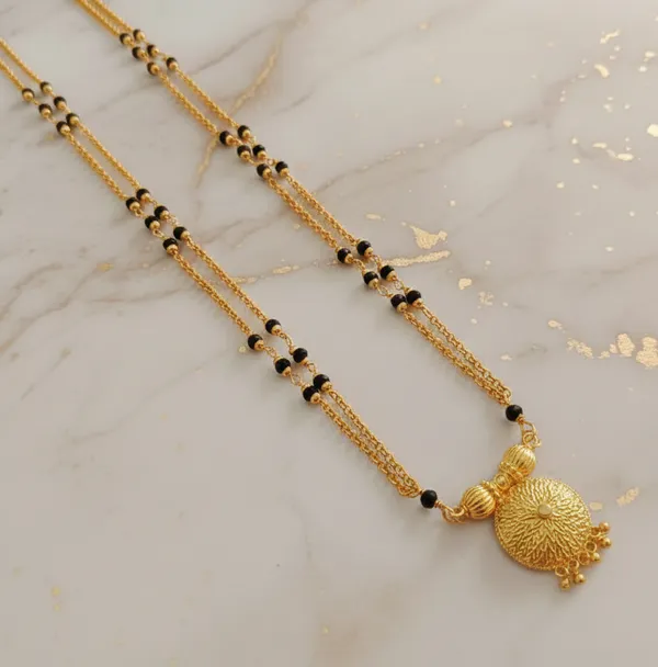Gold-Plated_Double-Layered_Black_Bead_Mala_with_Filigree_Sunburst_Pendant