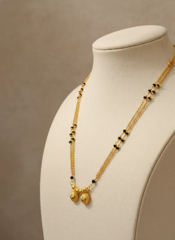 Gold-Plated_Dual-Layer_Long_Chain_Necklace_with_Intricate_Floral_Vati_Pendant