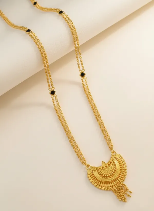 Gold-Plated_Long_Necklace_with_Traditional_Temple_Art_Pendant_and_Black_Bead_Accents