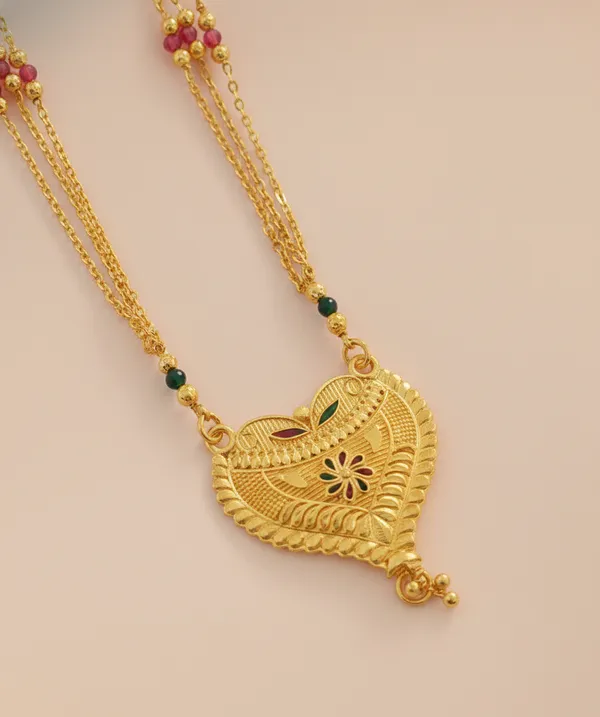 Gold_Triple-Strand_Necklace_with_Heart-Shaped_Filigree_Pendant