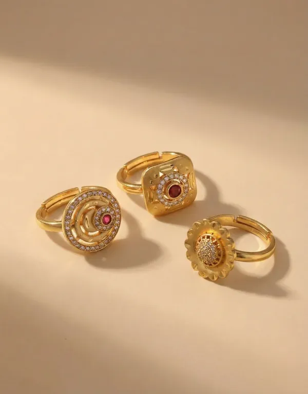 Trio_of_Traditional_Gold_Statement_Rings_with_Ruby_and_Zircon_Accents