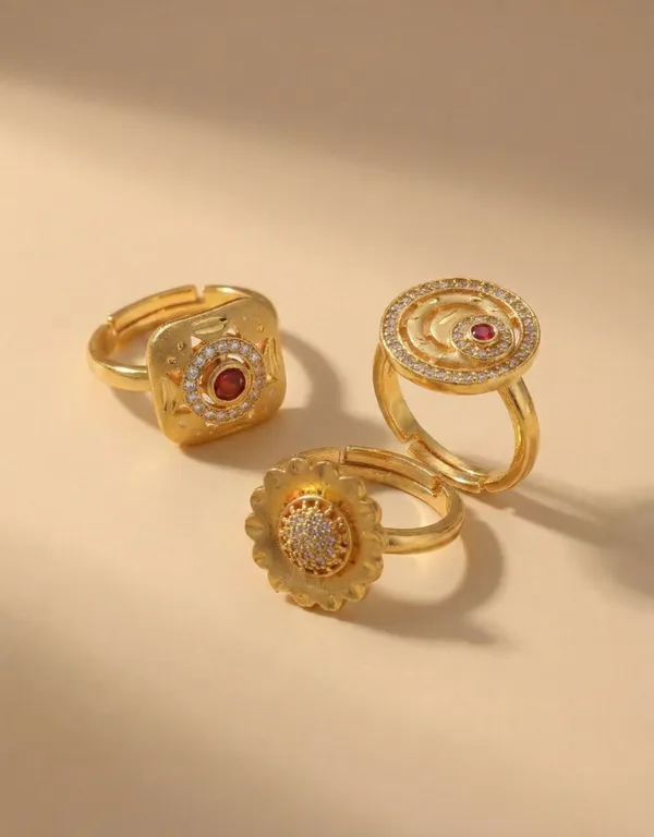 Trio_of_Traditional_Gold_Statement_Rings_with_Ruby_and_Zircon_Accents