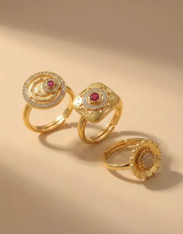 Trio_of_Traditional_Gold_Statement_Rings_with_Ruby_and_Zircon_Accents