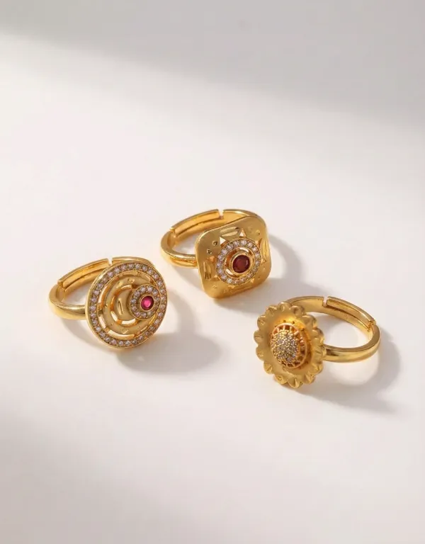 Trio_of_Traditional_Gold_Statement_Rings_with_Ruby_and_Zircon_Accents