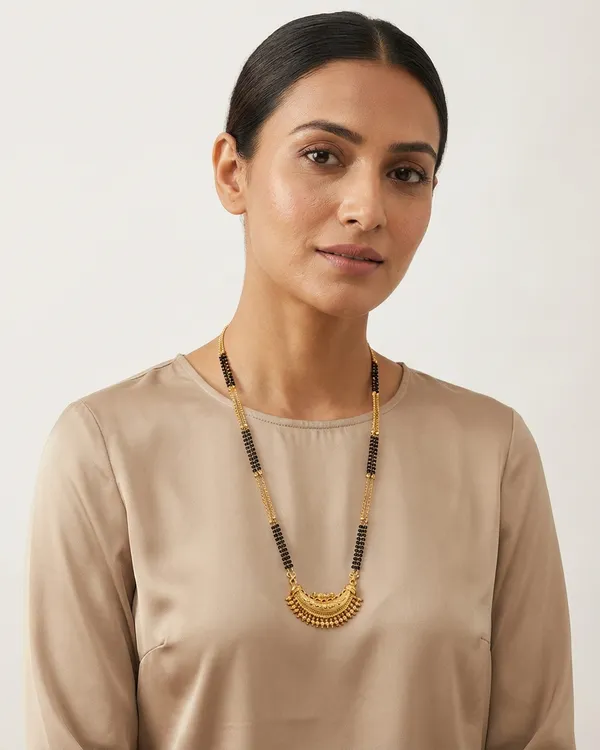 Fancy_Black_Bead_Mangalsutra_with_Engraved_Crescent_Design