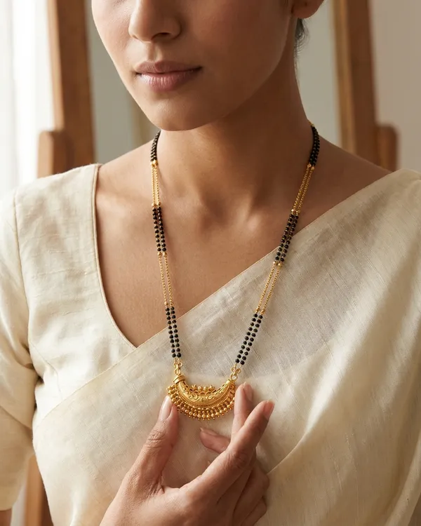 Fancy_Black_Bead_Mangalsutra_with_Engraved_Crescent_Design