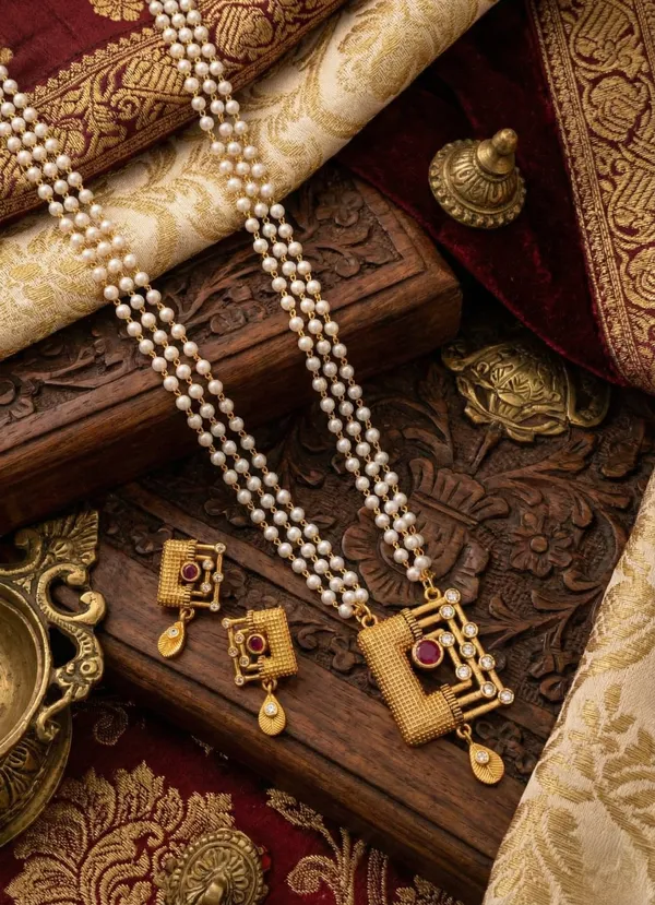 Regal_Triple-Strand_Pearl_Necklace_Set_with_Geometric_Gold_Pendant