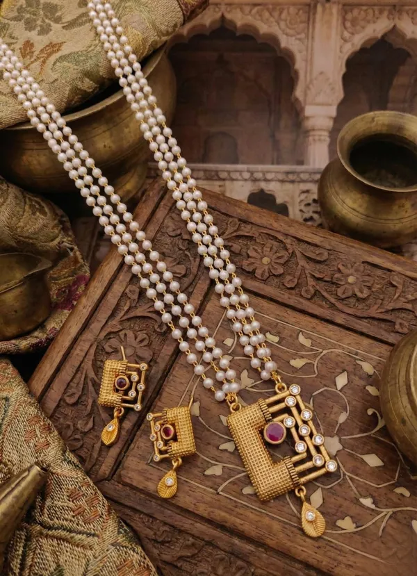Regal_Triple-Strand_Pearl_Necklace_Set_with_Geometric_Gold_Pendant