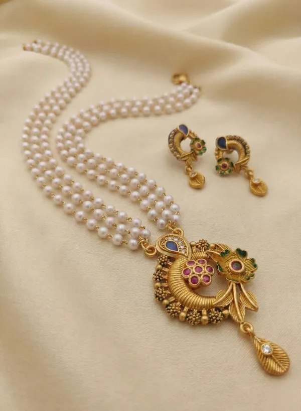 Three-Layered_Pearl_Mala_with_Antique_Gold_Floral_Pendant_&_Matching_Earrings