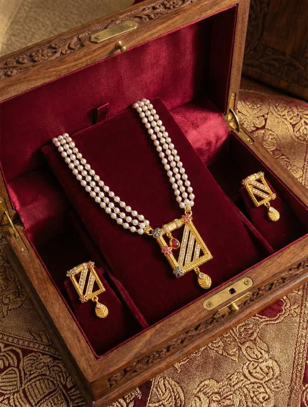 Three-Layered_Pearl_Mala_with_Geometric_Gold-Toned_Pendant_and_Matching_Earrings