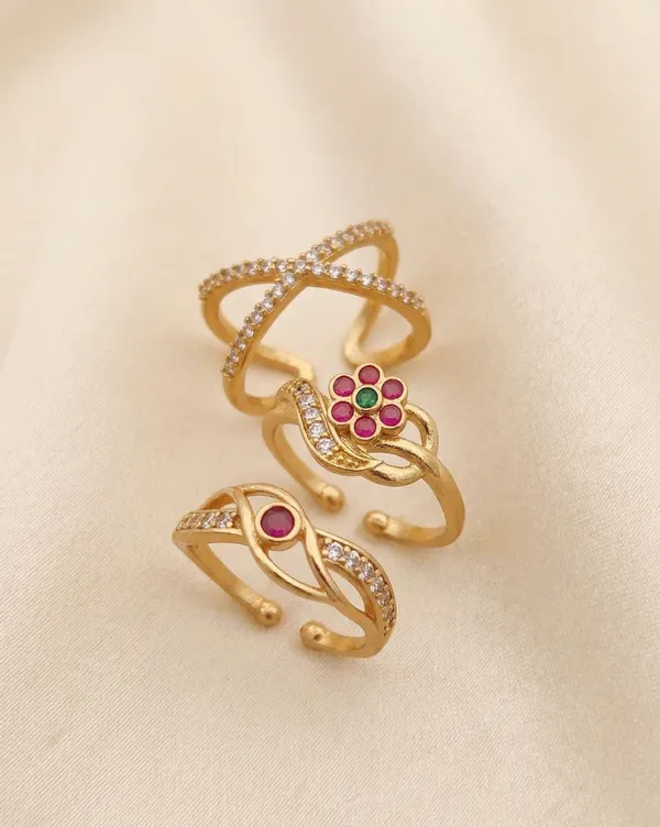 Three-Ring_Set:_This_set_includes_three_unique_gold-plated_rings.