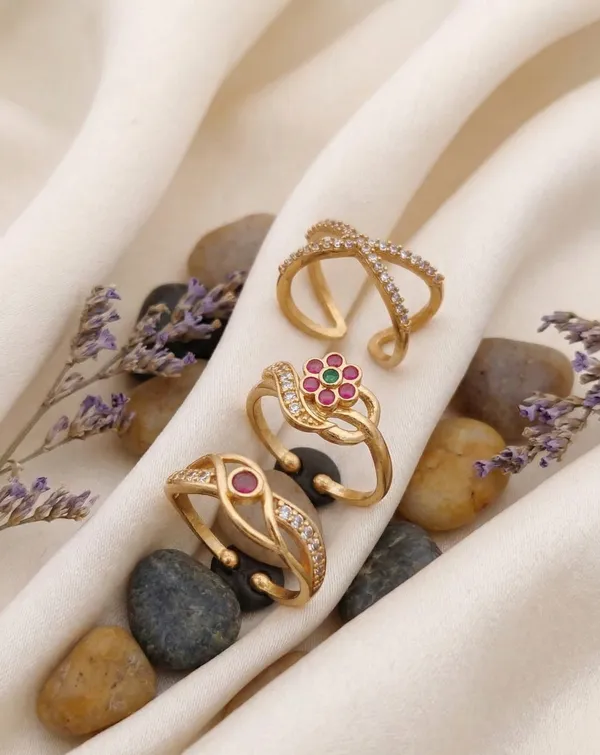 Three-Ring_Set:_This_set_includes_three_unique_gold-plated_rings.