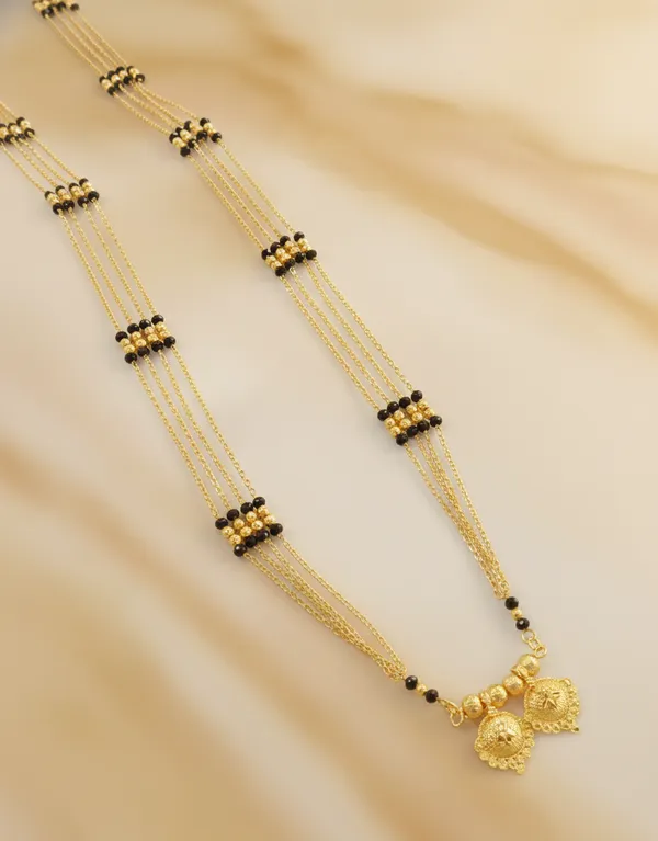 Timeless_Multi-Strand_Gold_Mangalsutra_with_Traditional_Wati_Pendant