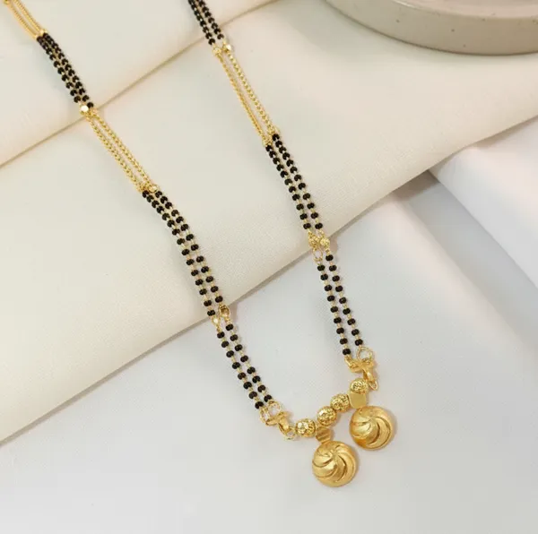 Traditional_Dual-Wati_Gold_Mangalsutra_with_Multi-Strand_Black_Bead_Chain