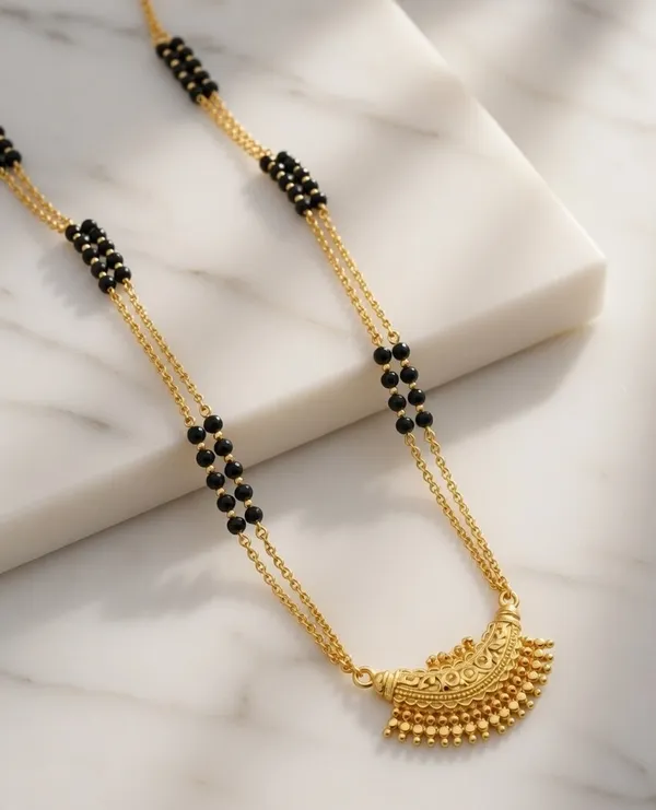 Traditional_Gold-Plated_Crescent_Mangalsutra_with_Double-Layered_Black_Bead_Chain