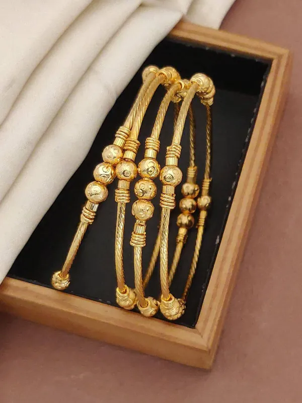 Traditional_Gold-Plated_Twisted_Wire_Bangles_with_Textured_Beads_(Set_of_4)
