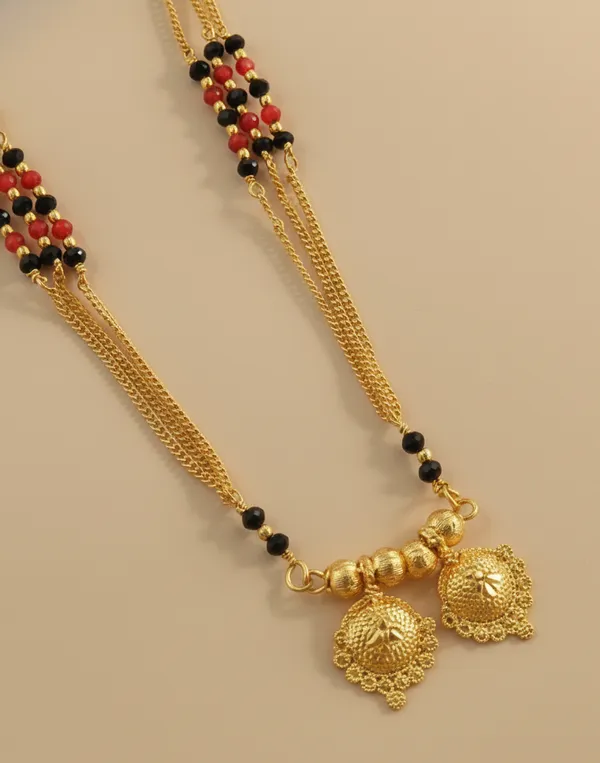 Traditional_Multi-Strand_Gold_and_Black_Bead_Mangalsutra_with_Floral_Pendants