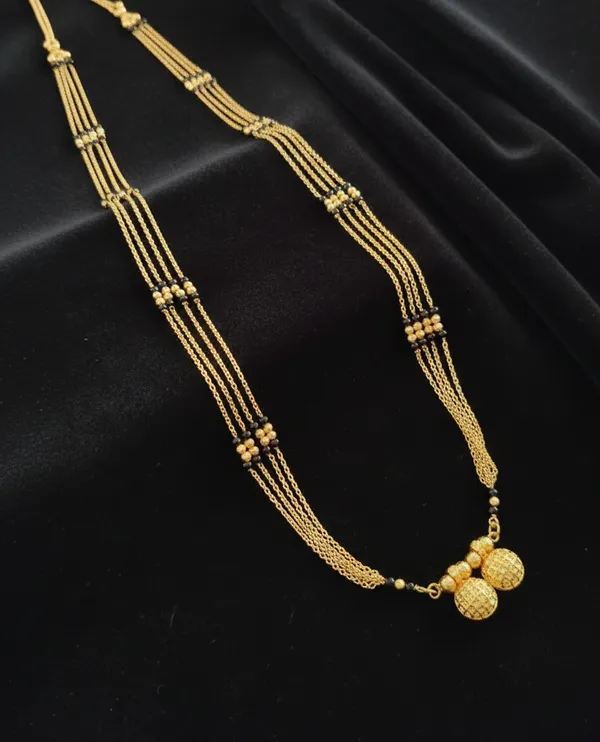 Traditional_Multi-Strand_Gold_and_Black_Bead_Mangalsutra_with_Vati_Pendant