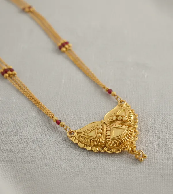 Traditional_Three-Strand_Gold_Mala_with_Intricate_Filigree_Pendant