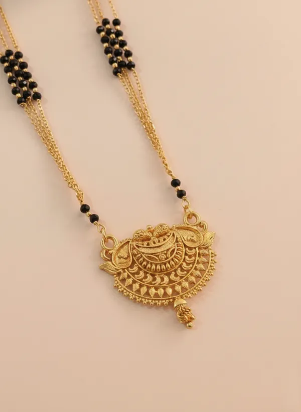 Traditional_Triple-Strand_Gold_Mangalsutra_with_Filigree_Pendant