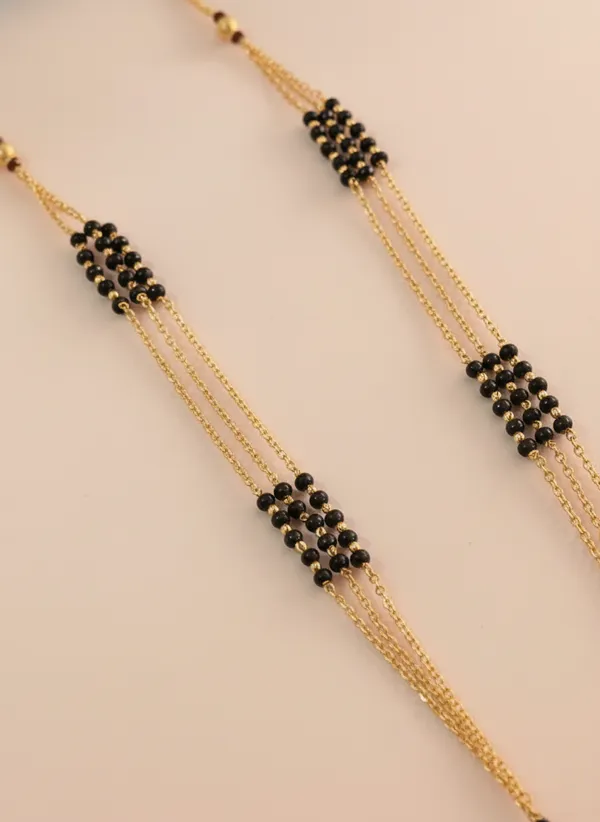 Traditional_Triple-Strand_Gold_Mangalsutra_with_Filigree_Pendant