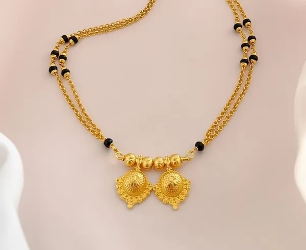 Traditional__Gold-Plated_Karimani_Bead_Necklace_with_Dual_Floral_Pendants