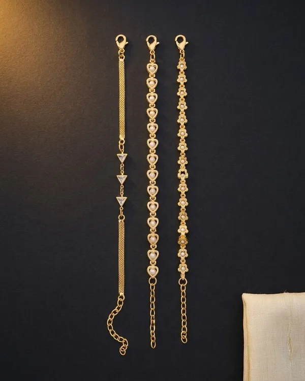 Trio_of_Gold-Plated_Charms:_Heart,_Star,_and_Geometric_Bracelet_Set