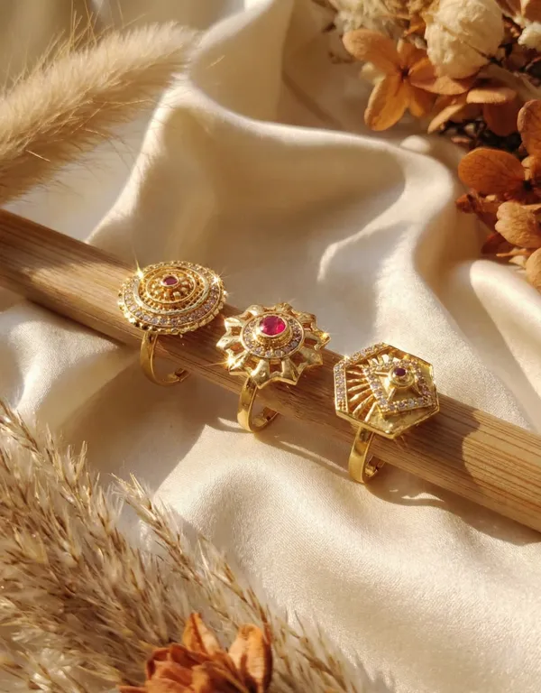 Trio_of_Traditional_Gold-Finished_Filigree_Rings_with_Ruby_and_Zircon_Accents