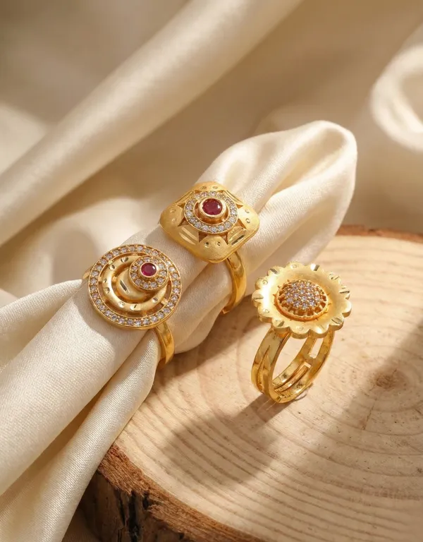 Trio_of_Traditional_Gold_Statement_Rings_with_Ruby_and_Zircon_Accents