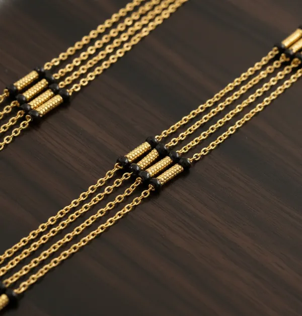 Triple-Strand_Gold_Mangalsutra_with_Textured_Vati_Pendants
