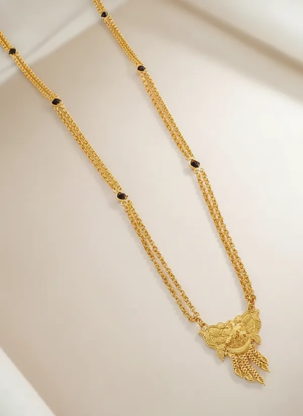 Triple-Strand_Gold_Necklace_with_Ornate_Pendant