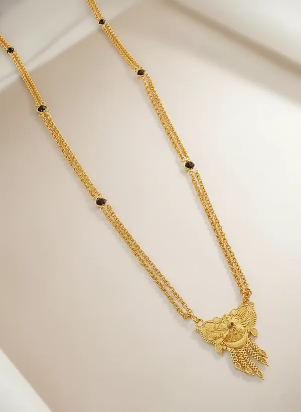 Triple-Strand_Gold_Necklace_with_Ornate_Pendant