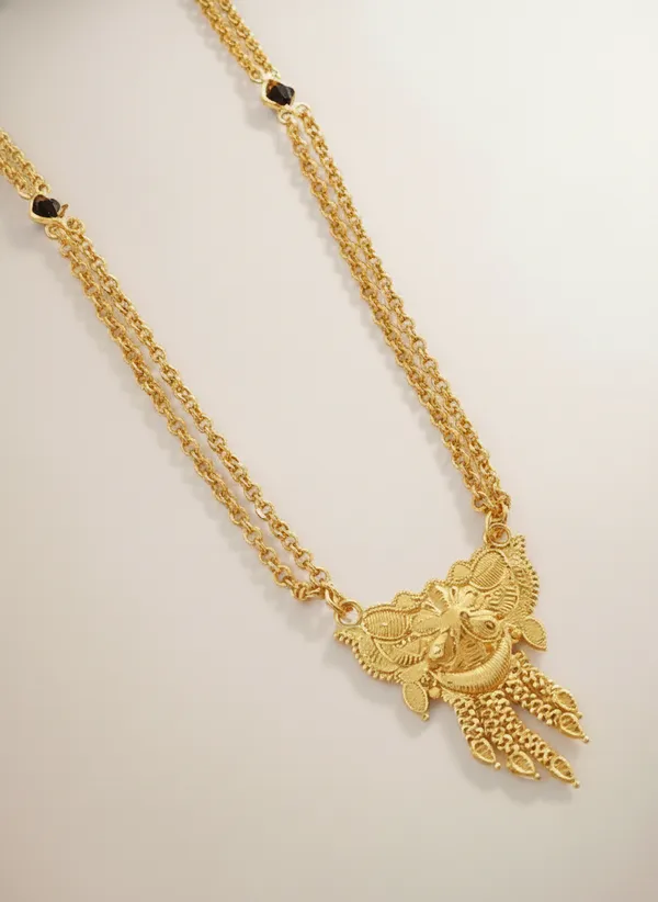 Triple-Strand_Gold_Necklace_with_Ornate_Pendant
