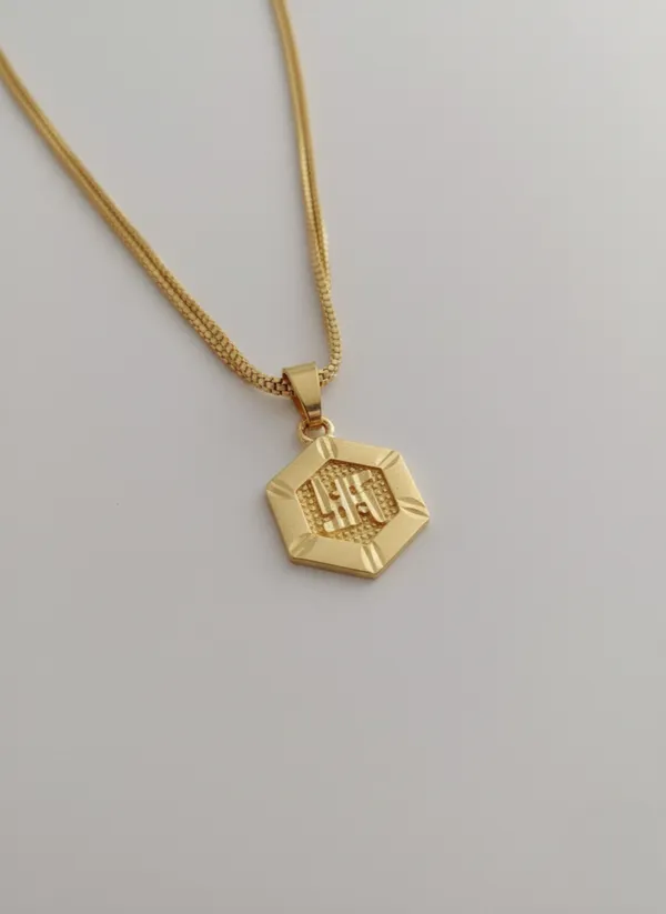 Gold-Toned_Hexagon_Pendant_Necklace_with_SWASTIK_Encraved