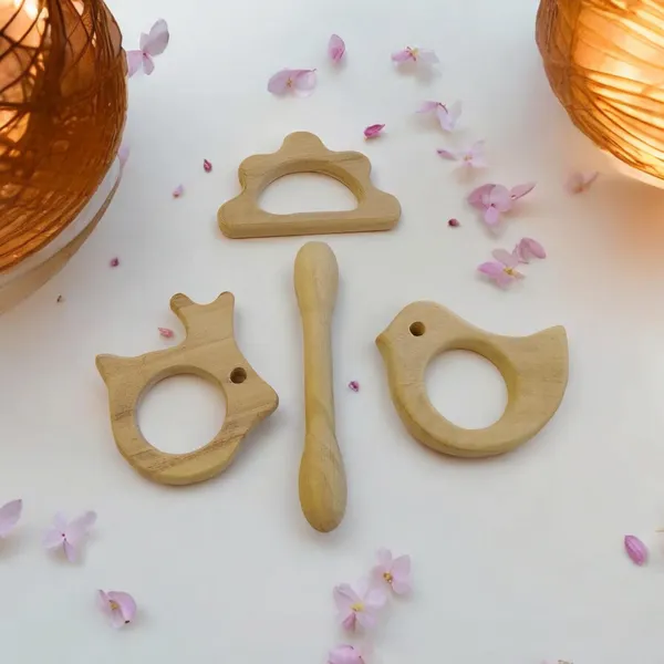 Pack_of_4_Neem_Wooden_Teethers_For_Babies_of_Age_0_To_3_Years|_Dumbbell,_Dove,_Cloud_&_Rabbit_Shapes