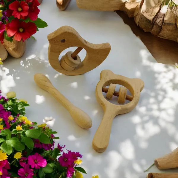 Combo_of_Rattles_&_Teether_-_Dove,_Mickey_Head_&_Dumbbell_Shapes