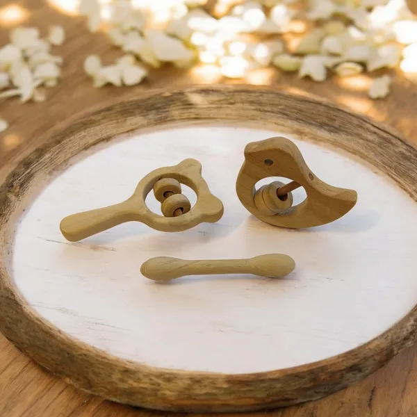 Combo_of_Rattles_&_Teether_-_Dove,_Mickey_Head_&_Dumbbell_Shapes