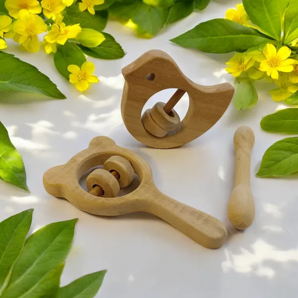 Combo_of_Rattles_&_Teether_-_Dove,_Mickey_Head_&_Dumbbell_Shapes
