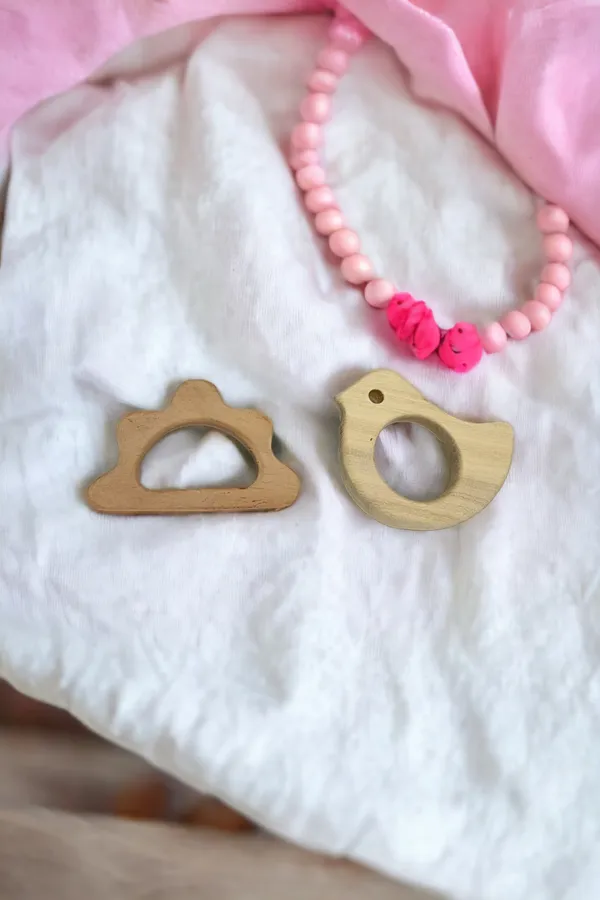 Pack_of_2_Neem_Wooden_Baby_Teethers_-_Dove,_Cloud_Shapes