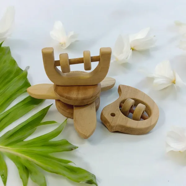 Neem_Wooden_Flower_Tumbler,_Dove_&_C_Shape_Rattles_for_Sensory_Development