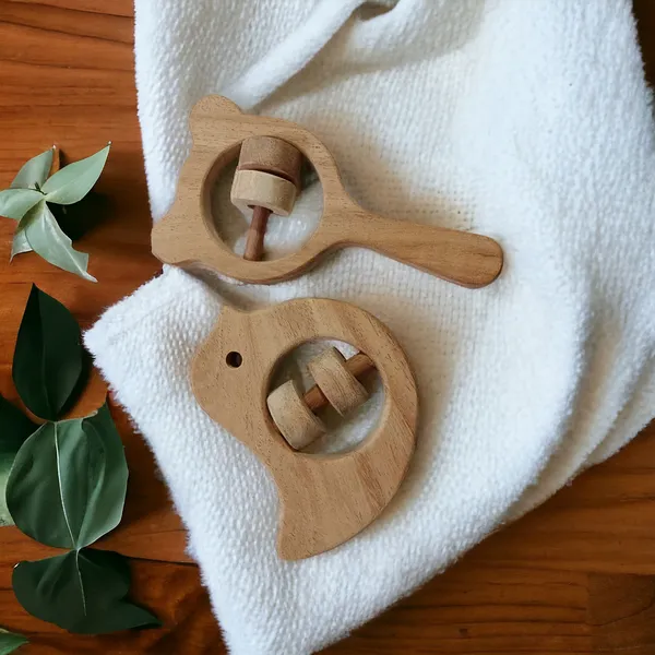 Pack_of_2_Neem_Wooden_Sound_Making_Rattles_of_Shapes_Dove_&_Mikey_Head