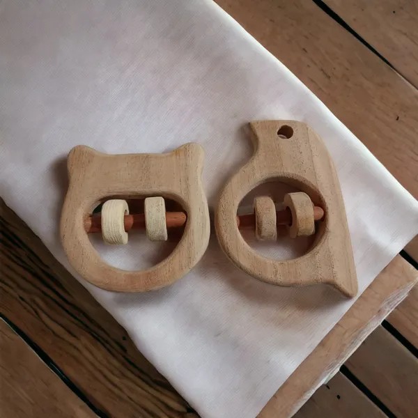 Nice_Sound_Making_Neem_Wooden_Rattles_for_Toddlers-_Hippo_Head_&_Sparrow_Shapes