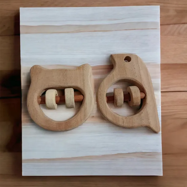 Nice_Sound_Making_Neem_Wooden_Rattles_for_Toddlers-_Hippo_Head_&_Sparrow_Shapes