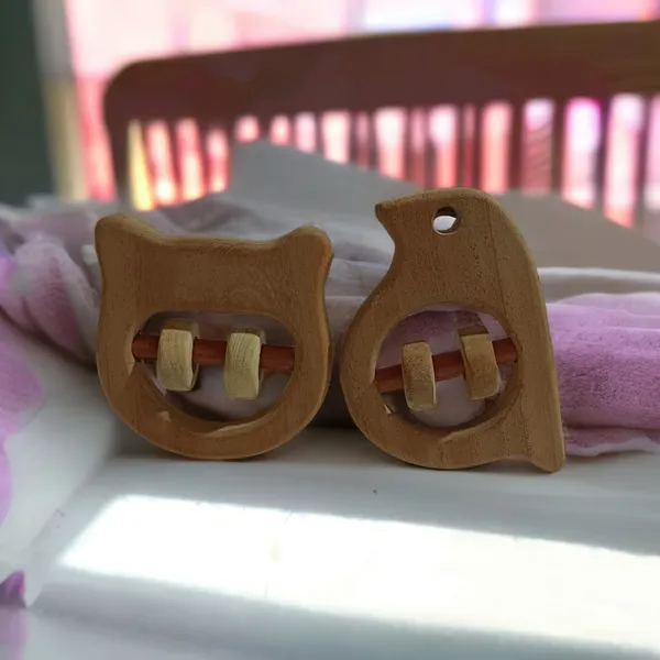 Nice_Sound_Making_Neem_Wooden_Rattles_for_Toddlers-_Hippo_Head_&_Sparrow_Shapes