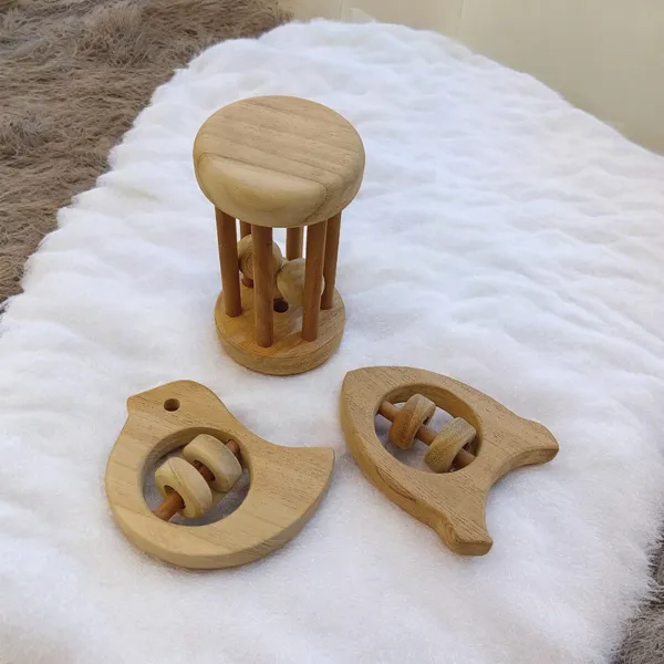Neem_Wooden_Tumbler,_Dove_&_Rocket_Shaped_Rattle