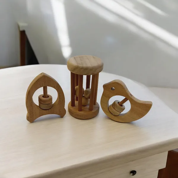 Neem_Wooden_Tumbler,_Dove_&_Rocket_Shaped_Rattle